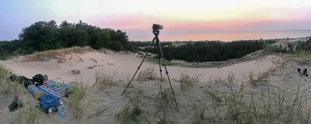 Additional photograph made by Brian Kaufman while working on "Dark & Stormy" nature-in-motion piece shows the photographer's tripod on the dune top mid-summer.
