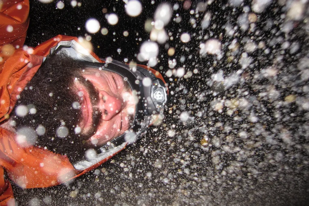 Additional photograph made by Brian Kaufman while working on "Dark & Stormy" nature-in-motion piece shows the photograpehr getting blasted by sand during a gale.
