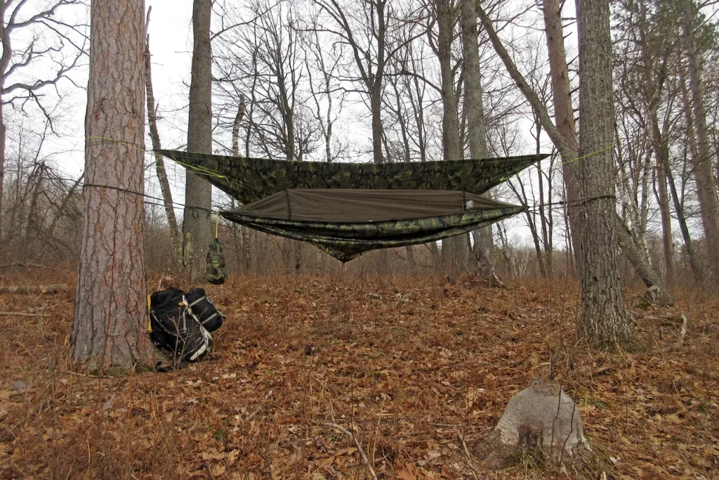 Additional photograph made by Brian Kaufman while working on "The Trumpeter" nature-in-motion piece shows his hammock setup