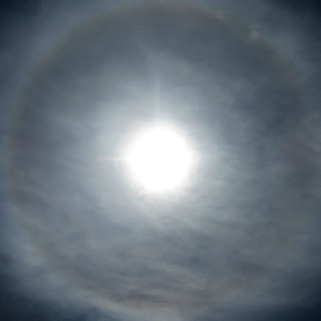 Additional photograph made by Brian Kaufman while working on "Totality" nature-in-motion piece shows a sun halo in cirrus clouds